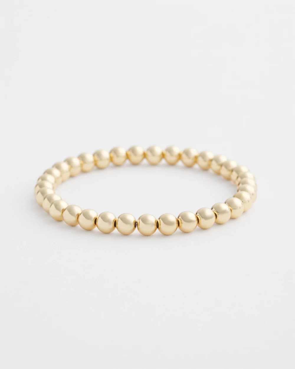 Chico's Small Beaded Gold Tone Stretch Bracelet